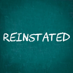 REINSTATED written on chalkboard