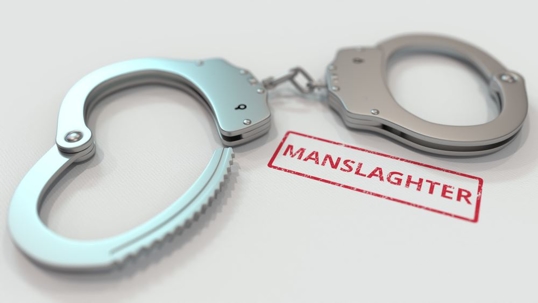 Manslaughter sign next to cuffs